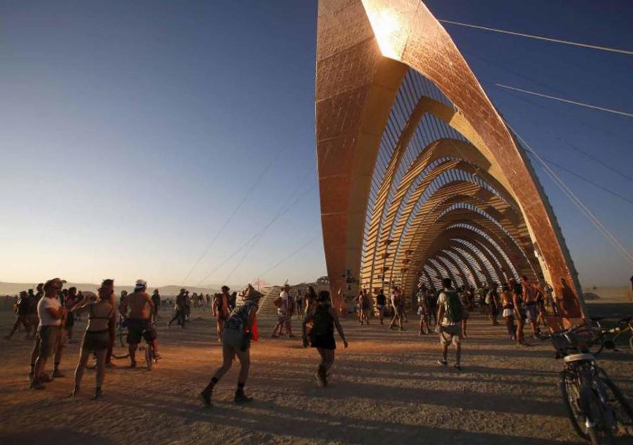 A large metal arching structure at Burning Man.