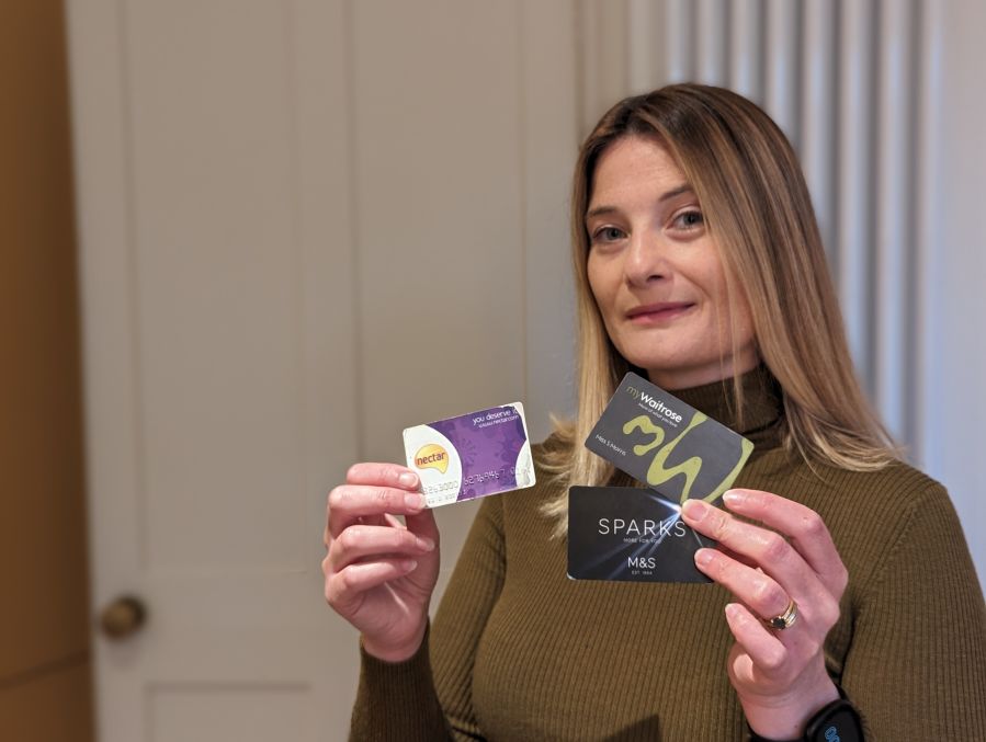 Sophie Morris with supermarket loyalty cards.