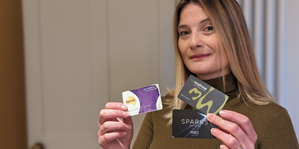 Sophie Morris with supermarket loyalty cards.