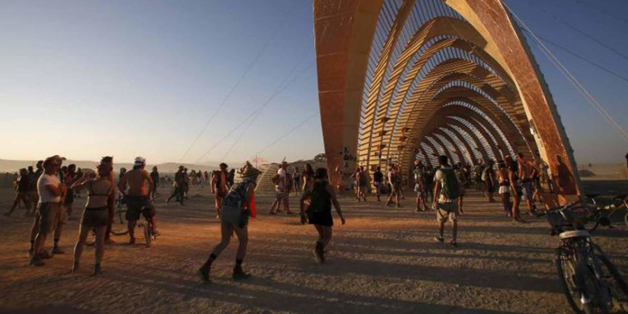 A large metal arching structure at Burning Man.