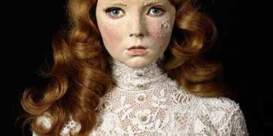 Lily Cole in a mask by Gillian Wearing.