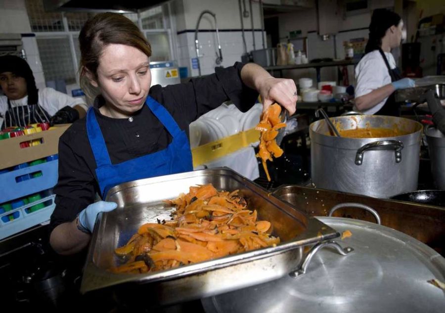 Chef Nicole Pisani serving quality school meals .