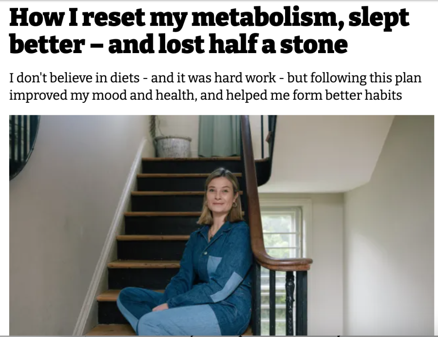 woman sitting on stairs in a house.