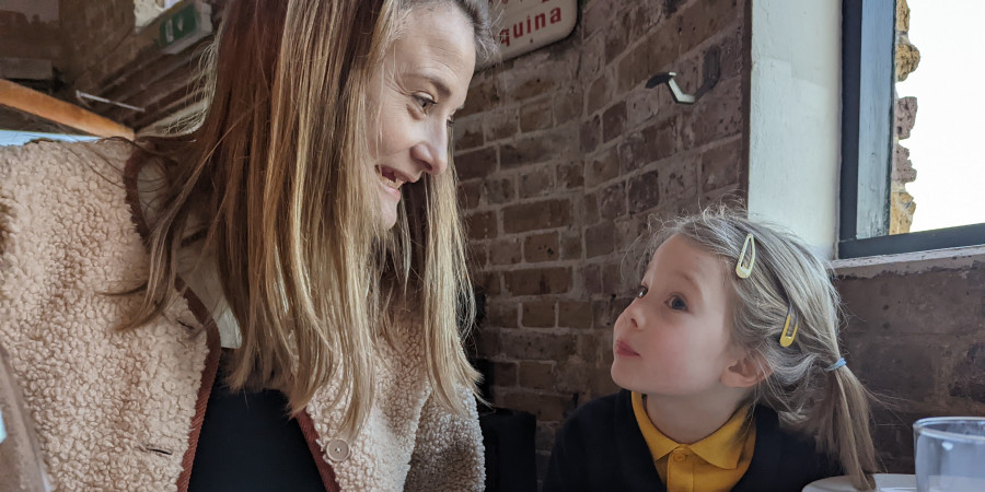 mother and daughter at restaurant.