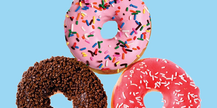 book cover of Why You East What You Eat, by Rachel Herz. Blue with icing covered donuts.